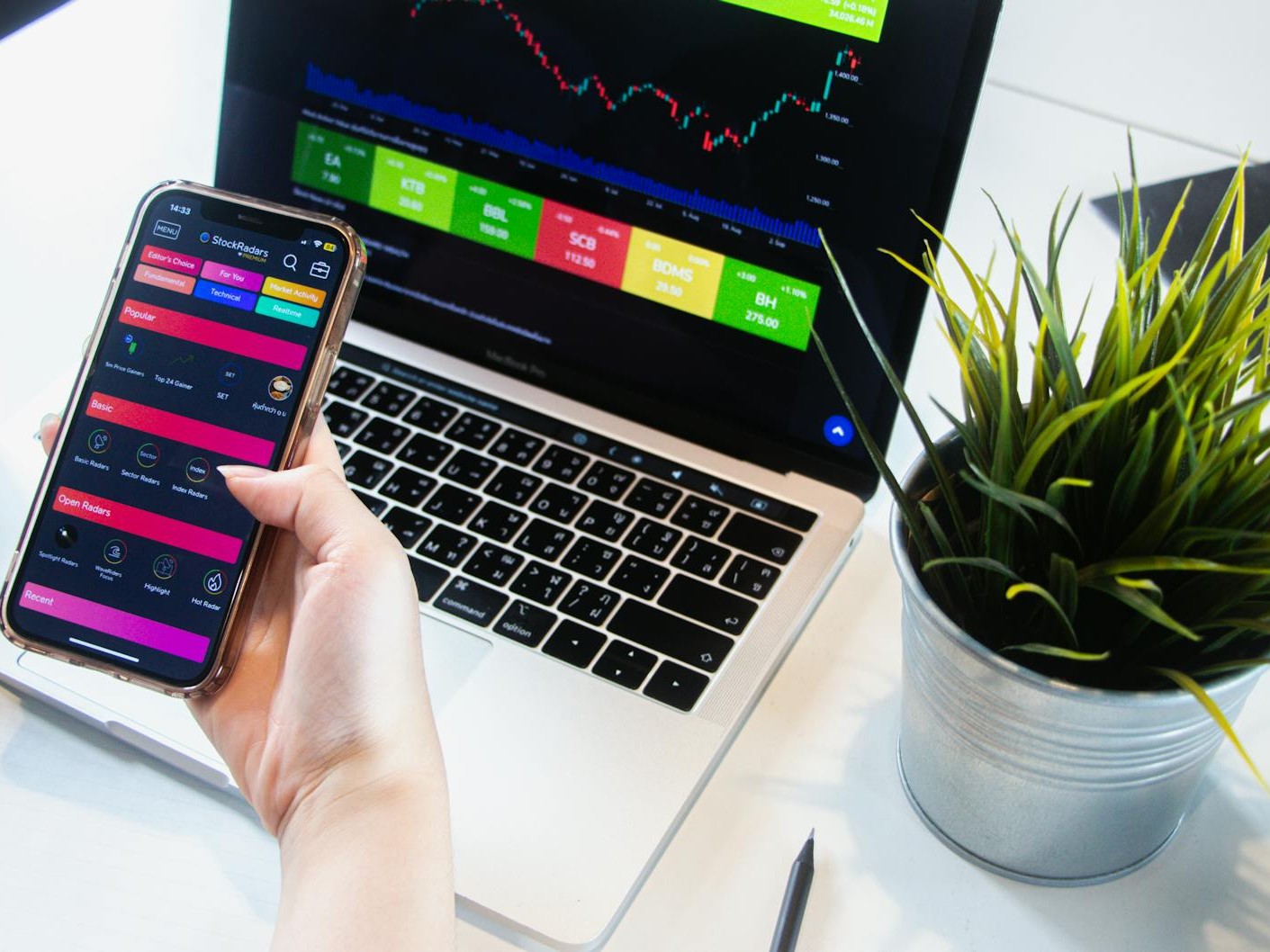 man looking at trades - Free trial prop firm