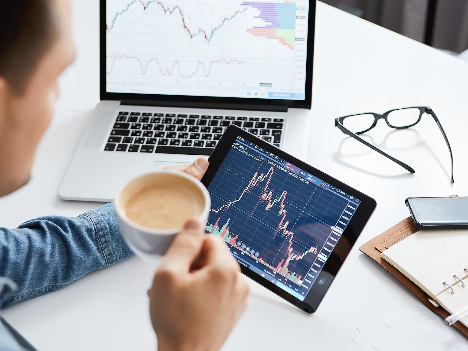 man looking at his trades - How Long Does It Take to Pass the Prop Firm Challeng