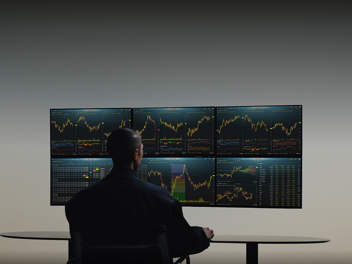 man looking at charts - Forex Prop Firm Challenge