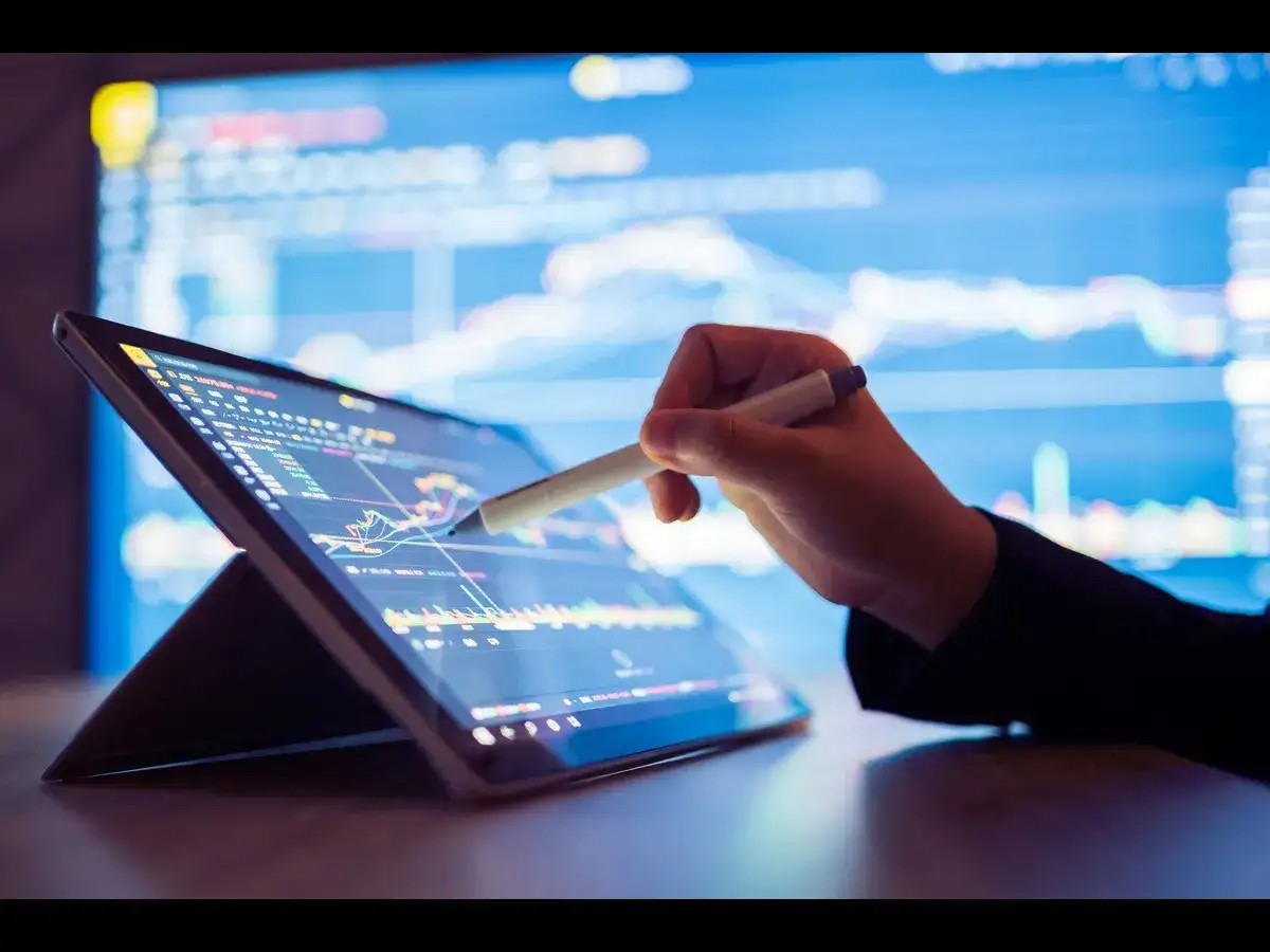 man making notes - Affordable Futures Prop Trading Challenge Options