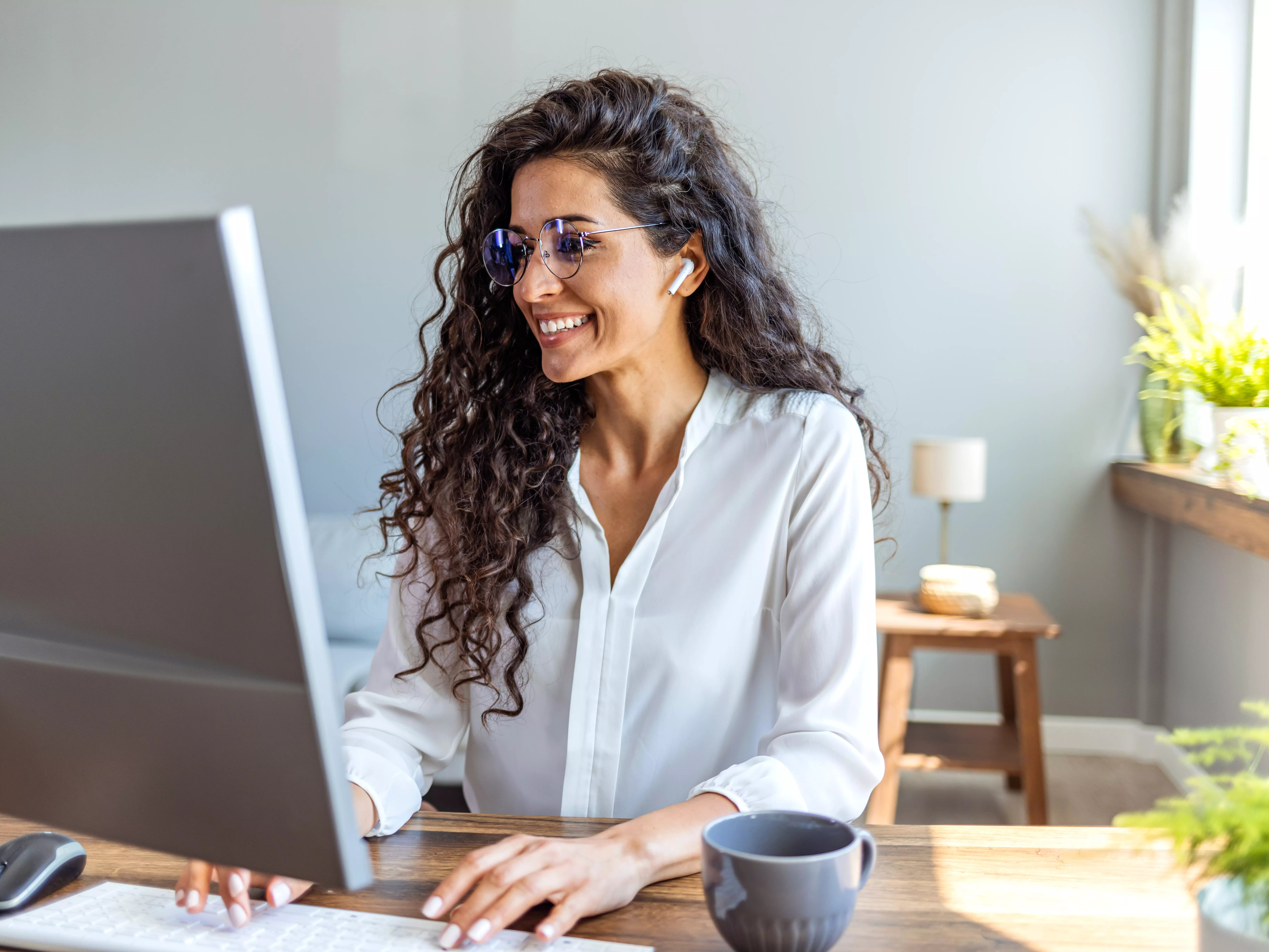 woman looking happy - Best Prop Trading Challenges with No Hidden Fees