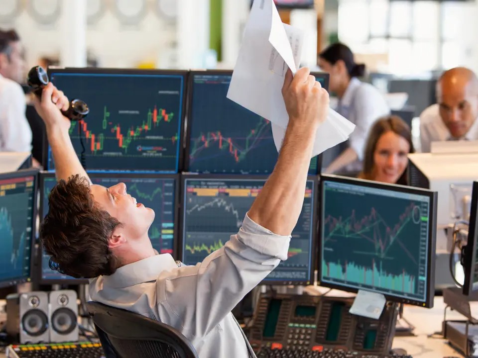 man celebrating - Is Day Trading Profitable