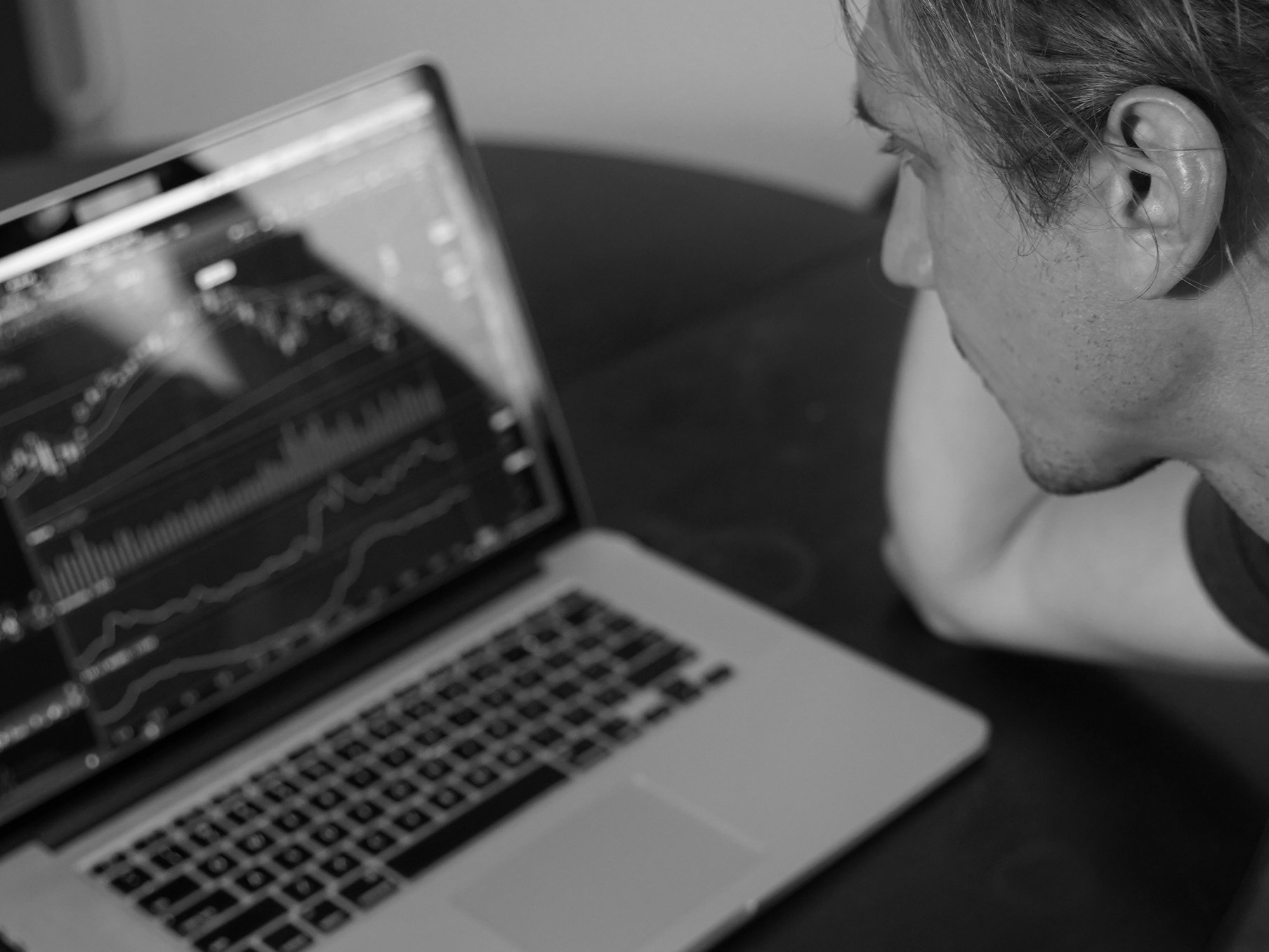 Person Using Laptop - futures vs stocks day trading